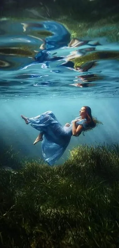 Woman in a blue dress floating underwater in a serene aquatic scene.