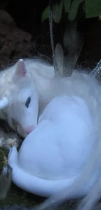 Sleeping unicorn with fairy wings in mystical scene.