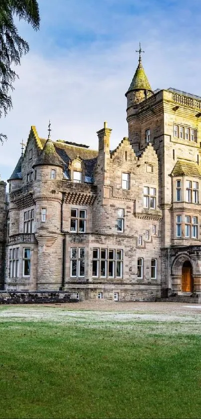 Enchanting stone castle amidst lush greenery and clear sky.