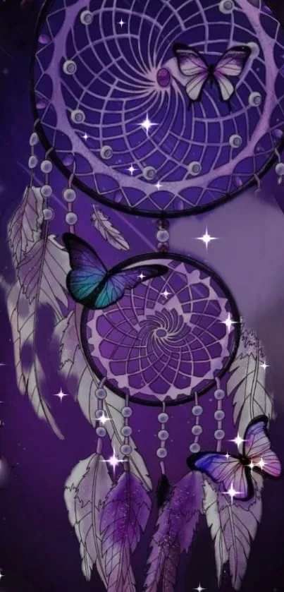 Purple dreamcatcher with butterflies and feathers on a dark background.