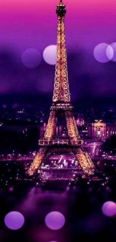 Illuminated Eiffel Tower with purple night sky.