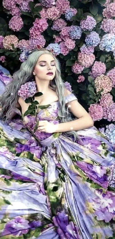 Woman in purple floral dress lying in hydrangea flowers.