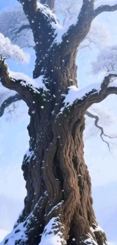 Majestic snow-covered tree in winter landscape.