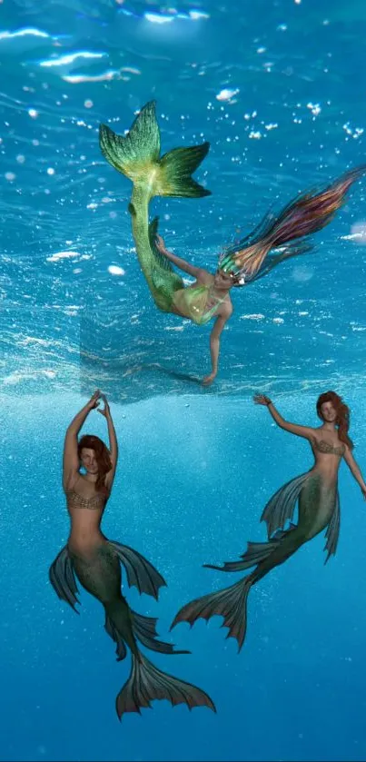 Mermaids swimming gracefully in a blue ocean scene.