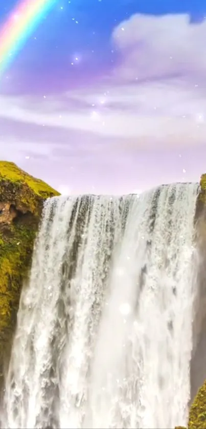 Waterfall with vibrant rainbow under a starry sky.