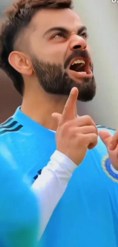 Athlete in blue jersey celebrating with passion.