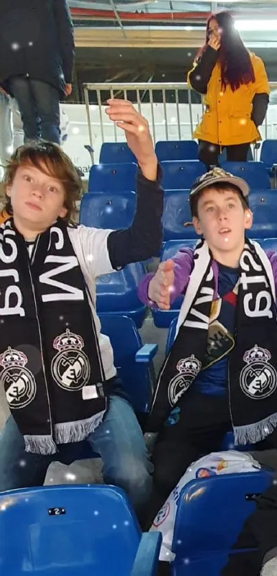 Football fans cheering energetically in a colorful stadium.