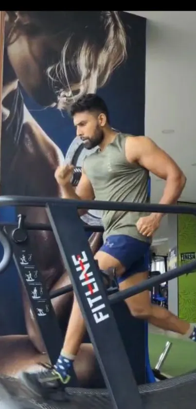 Man running on treadmill in gym setting.