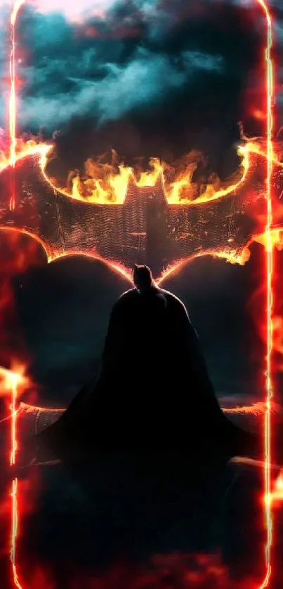 Silhouette of a hero with fiery Bat symbol in the dark night sky.