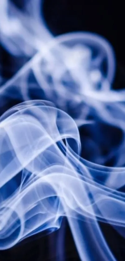 Ethereal blue smoke swirling in darkness.