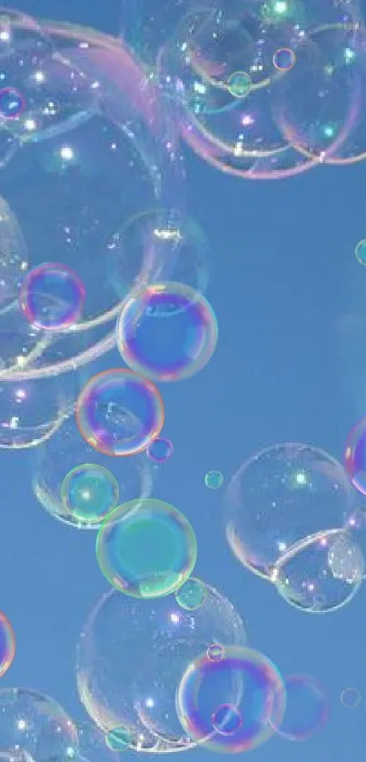 Floating bubbles against a blue sky, ethereal and serene wallpaper.