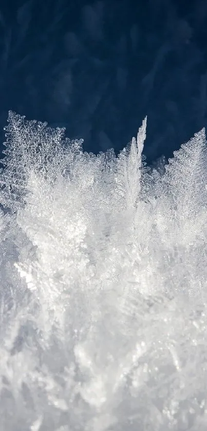 Intricate ice frost design on a mobile wallpaper.