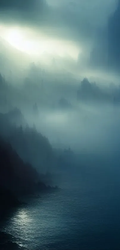 Ethereal misty mountains in blue tones for serene mobile wallpaper.