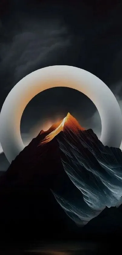 Mountain peak with halo, dark scenic wallpaper.