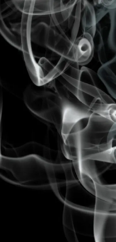 Monochromatic swirling smoke on a dark background.