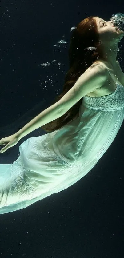 Woman in white dress floating underwater.