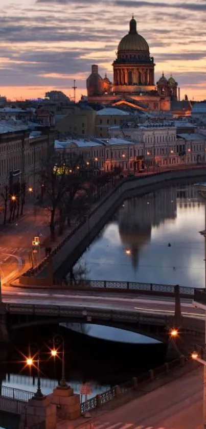 Evening cityscape with cathedral reflection and vibrant streetlights.