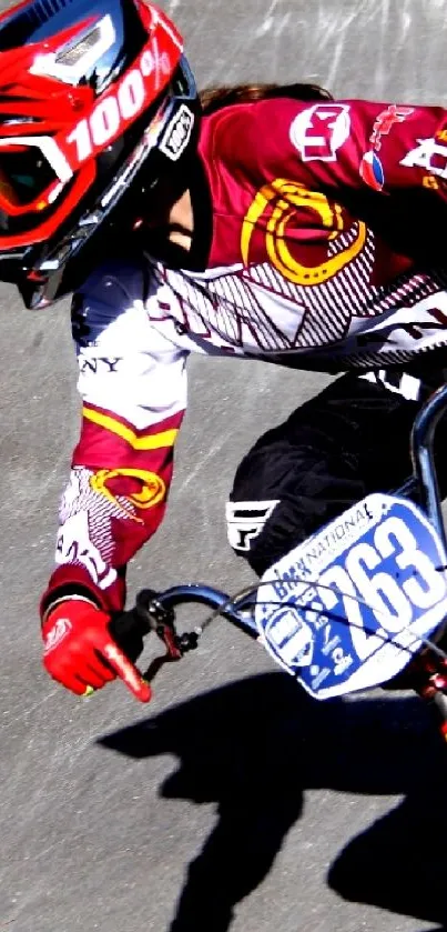 BMX rider performing a high-speed stunt on a track.