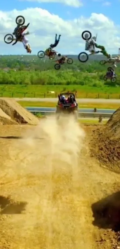 Exciting dirt bike stunt with riders in mid-air against a clear sky.