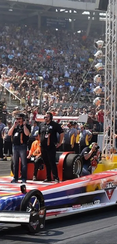 Drag racing car on track with crowd