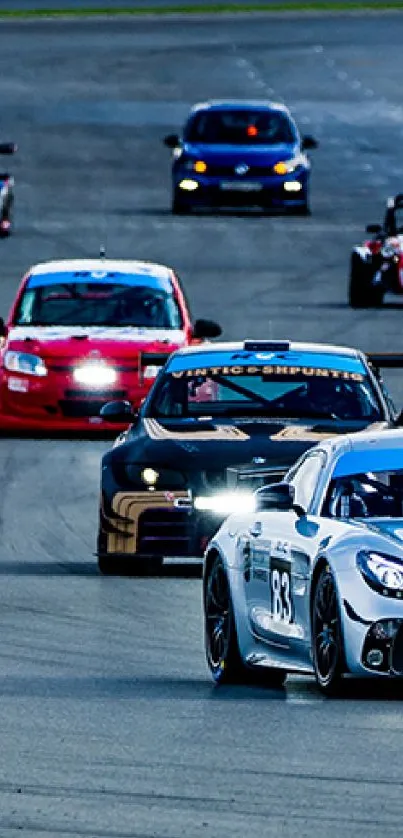 High-speed race cars on track in exciting action scene.