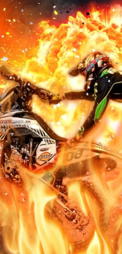 Motocross rider bursting through flames with explosive background.