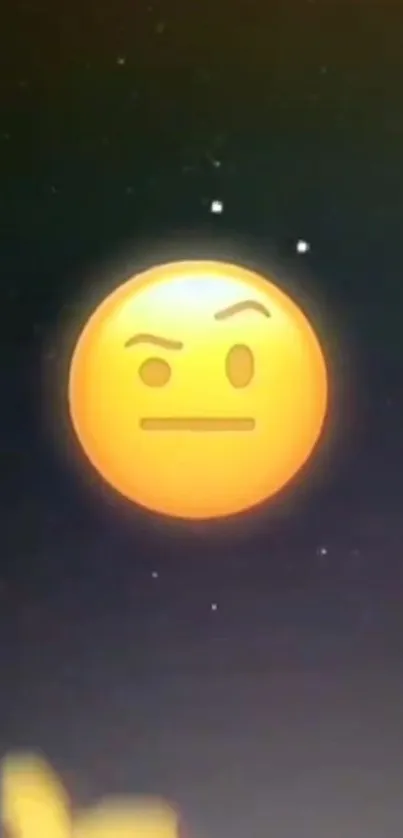 Expressive orange emoji glowing against a dark background wallpaper.