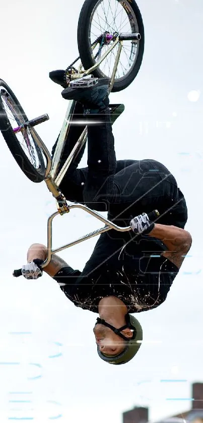 BMX rider performing a stunt mid-air against an urban backdrop.