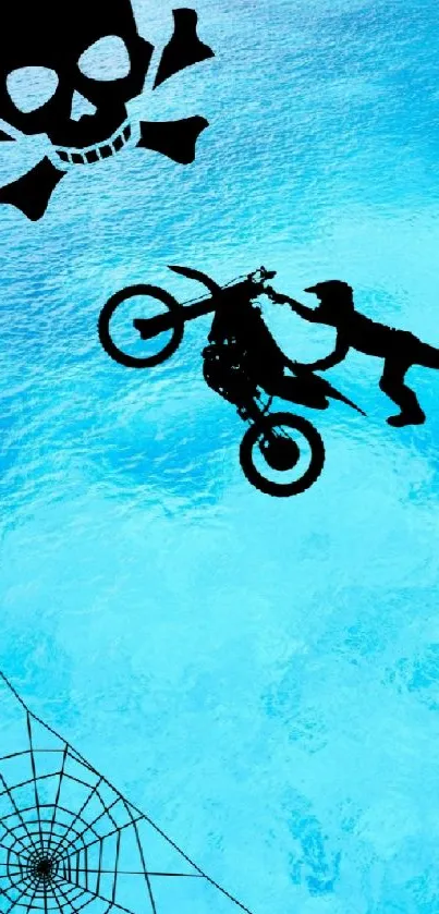 Motorcycle stunt over blue ocean with skull and web.