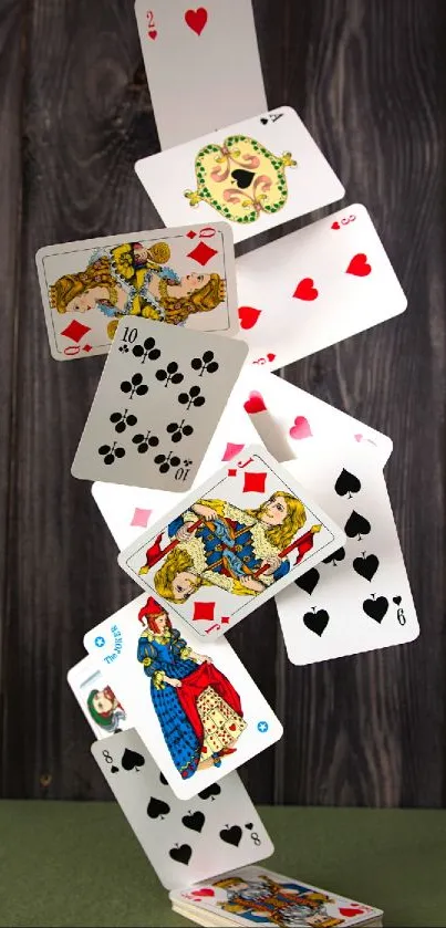 Dynamic display of falling playing cards against a deep brown wood background.