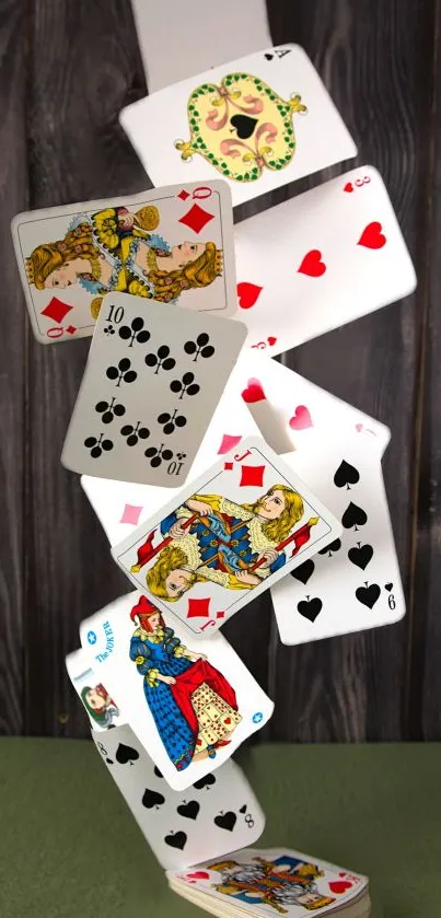 Playing cards cascading against a wooden background.