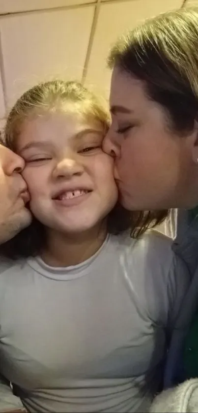 A heartwarming family moment with three people showing affection.