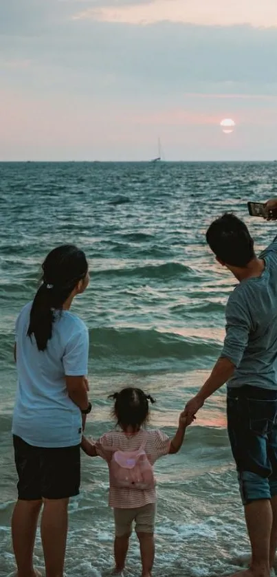 Family enjoying beach sunset, serene ocean view.