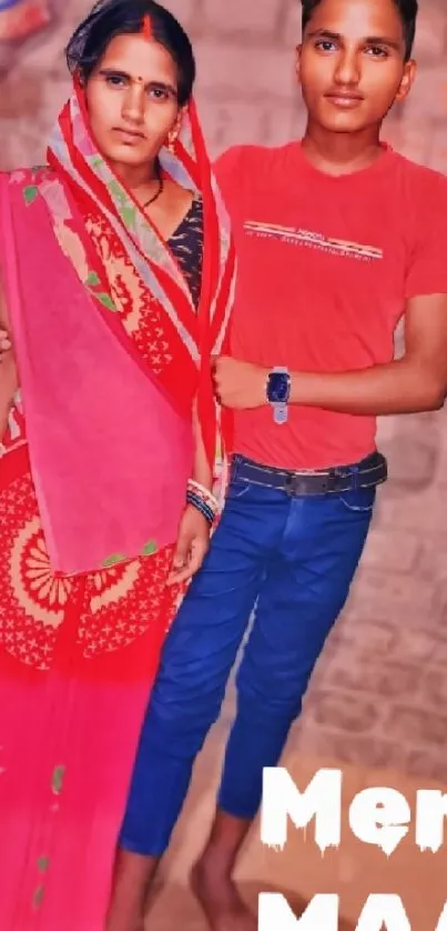 Mother and son in colorful attire posing.