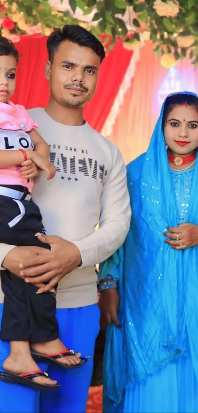 Family portrait in colorful attire during a celebration.