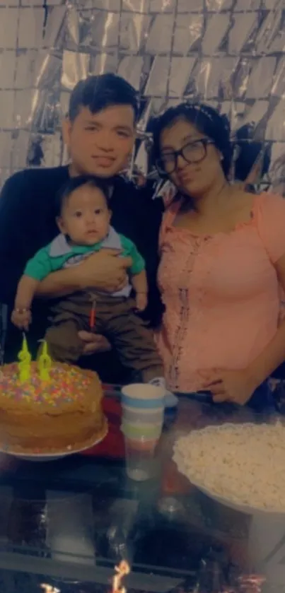 Family celebrating with cake and decorations.