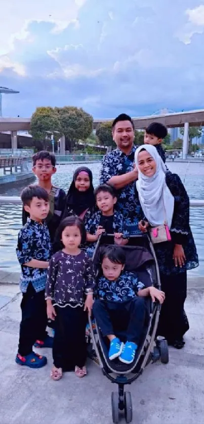 Happy family enjoying Marina Bay view with blue skies.