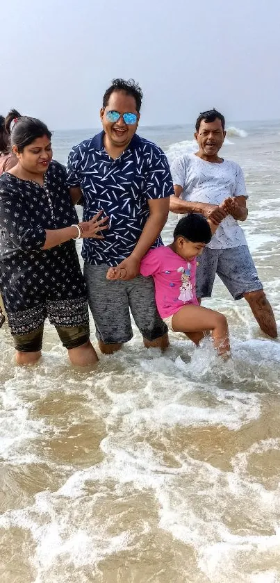 Family enjoying a fun day in the ocean waves at the beach.