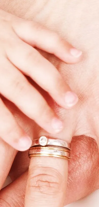 Close-up of family hands touching, symbolizing connection and warmth.