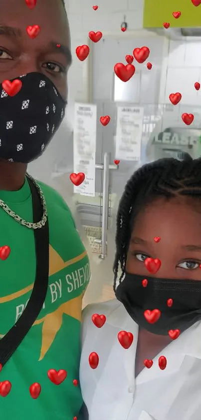 Family wearing masks with red hearts design.