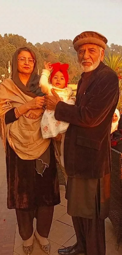 A family enjoying a warm sunset on a scenic terrace.