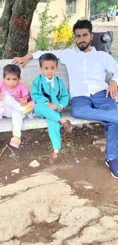 Family sitting on park bench. Peaceful scene.