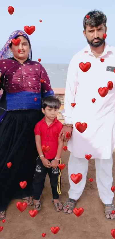 Family at the seaside with vibrant outfits.