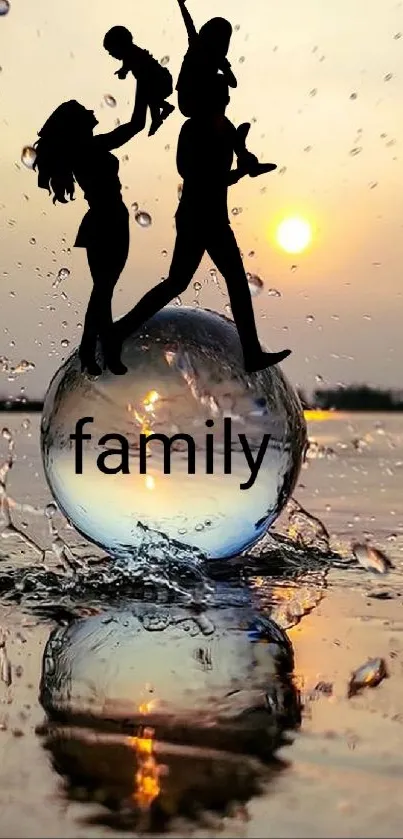 Family silhouettes in a sunset reflection on a beach with a glass sphere.