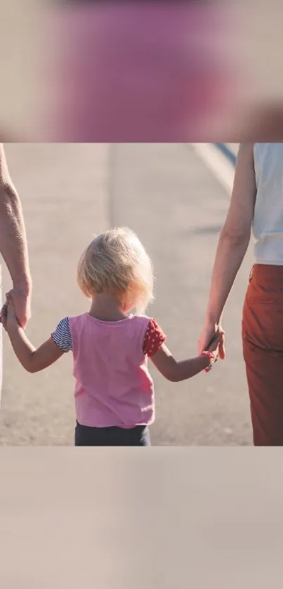 Mobile wallpaper of a family walking hand in hand.