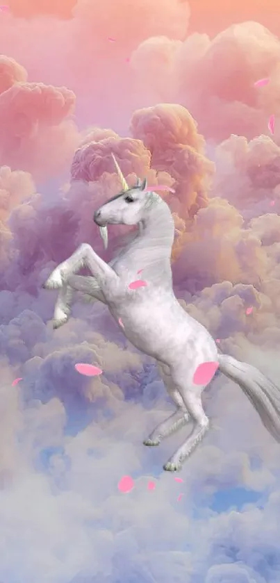 Unicorn rearing on pastel clouds with pink sky background.