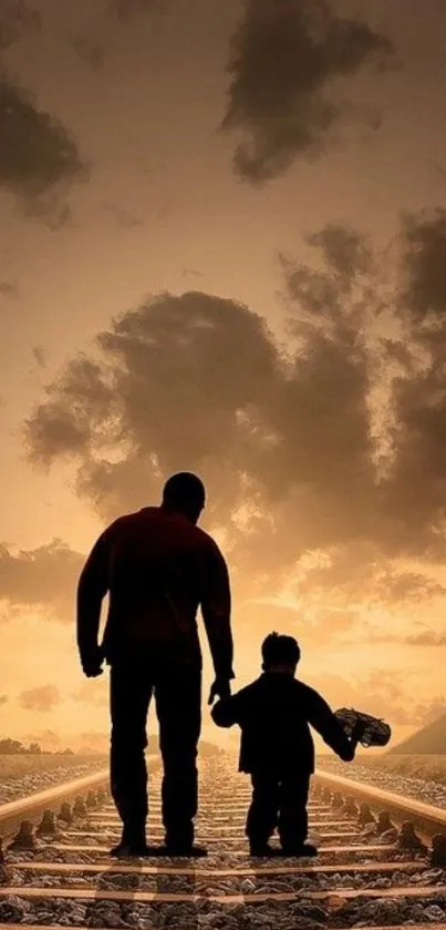 Father and child silhouetted on railroad tracks at sunset in a scenic wallpaper.