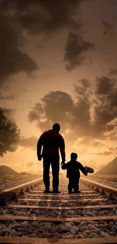Father and child walking on railroad at sunset.