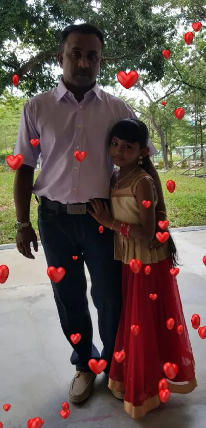 Father and daughter in a park with greenery.