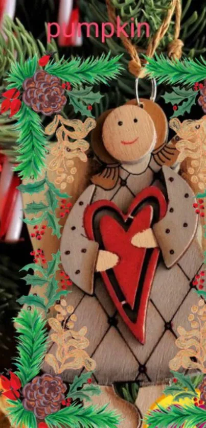 Festive angel ornament with heart and greenery on phone wallpaper.